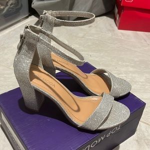 Size 6 in women silver high heels. Only used once.